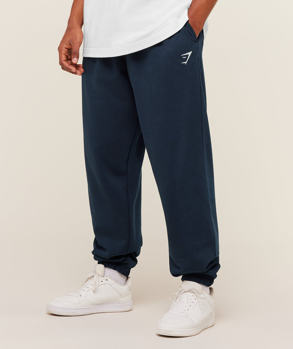 Gymshark Crest Oversized Joggers Azul Marino - detalle